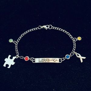 “Love” Autism Awareness bracelet with colorful rhinestone charms